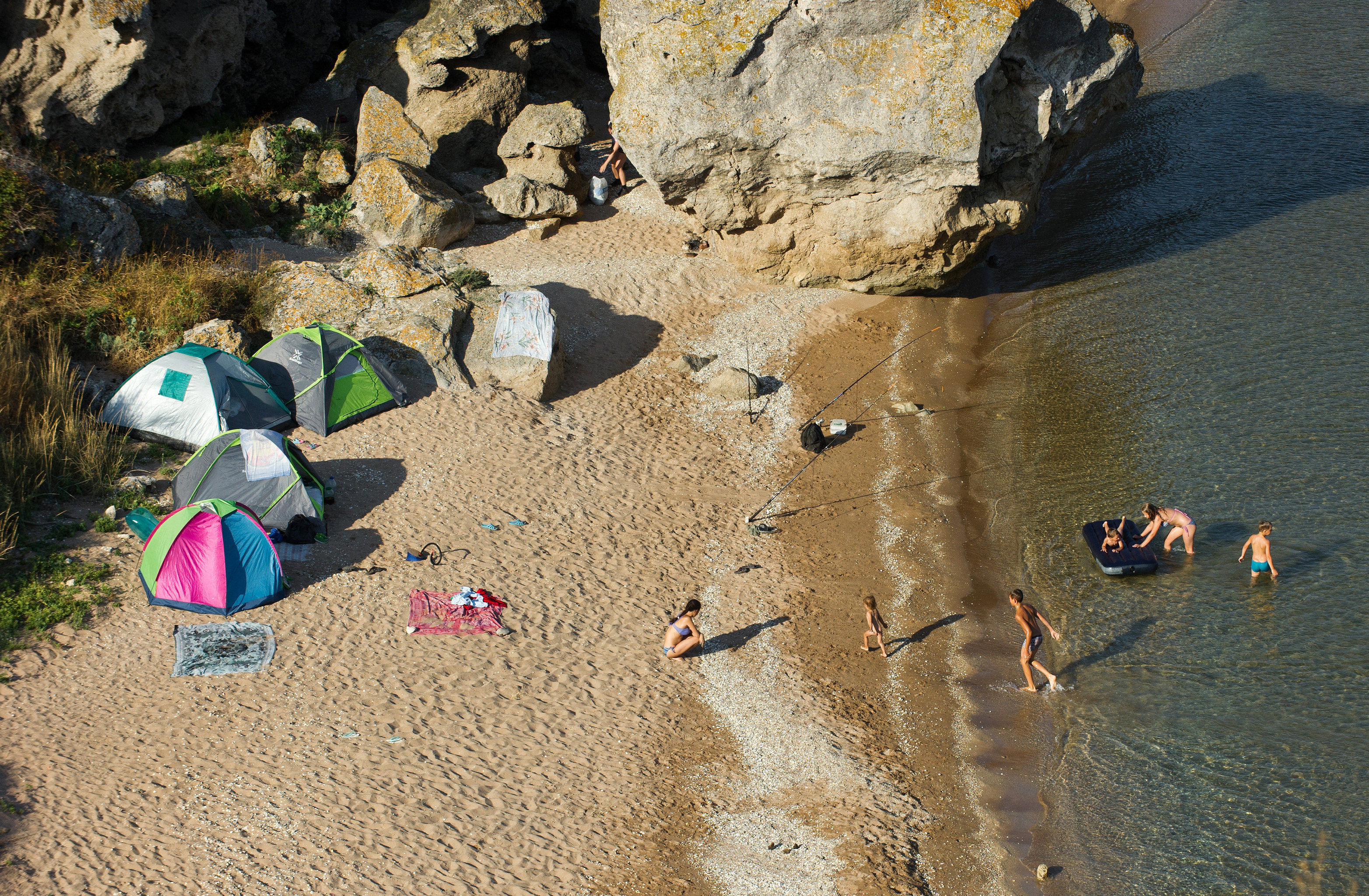 Vacationers by the rocks of the Generalskiye beaches