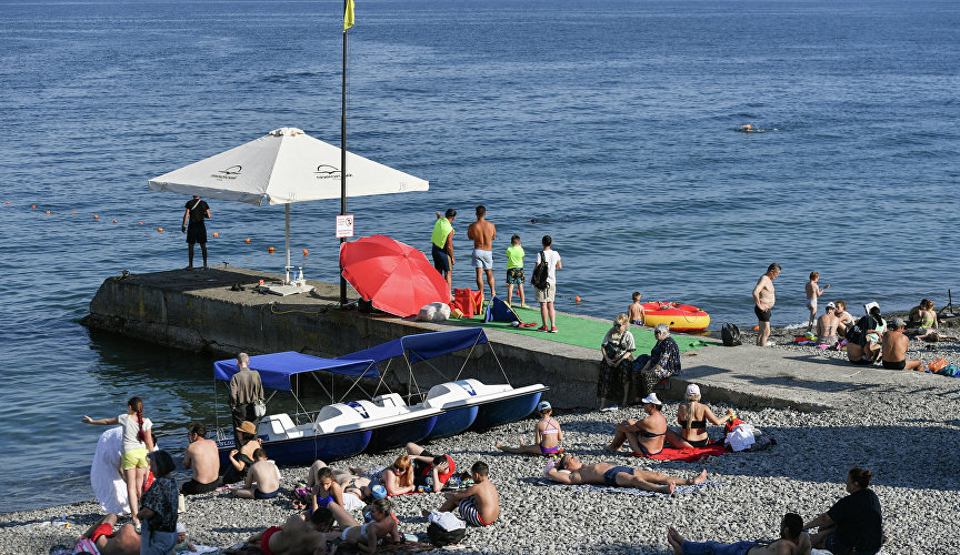 Holidaymakers on the beach in Yalta